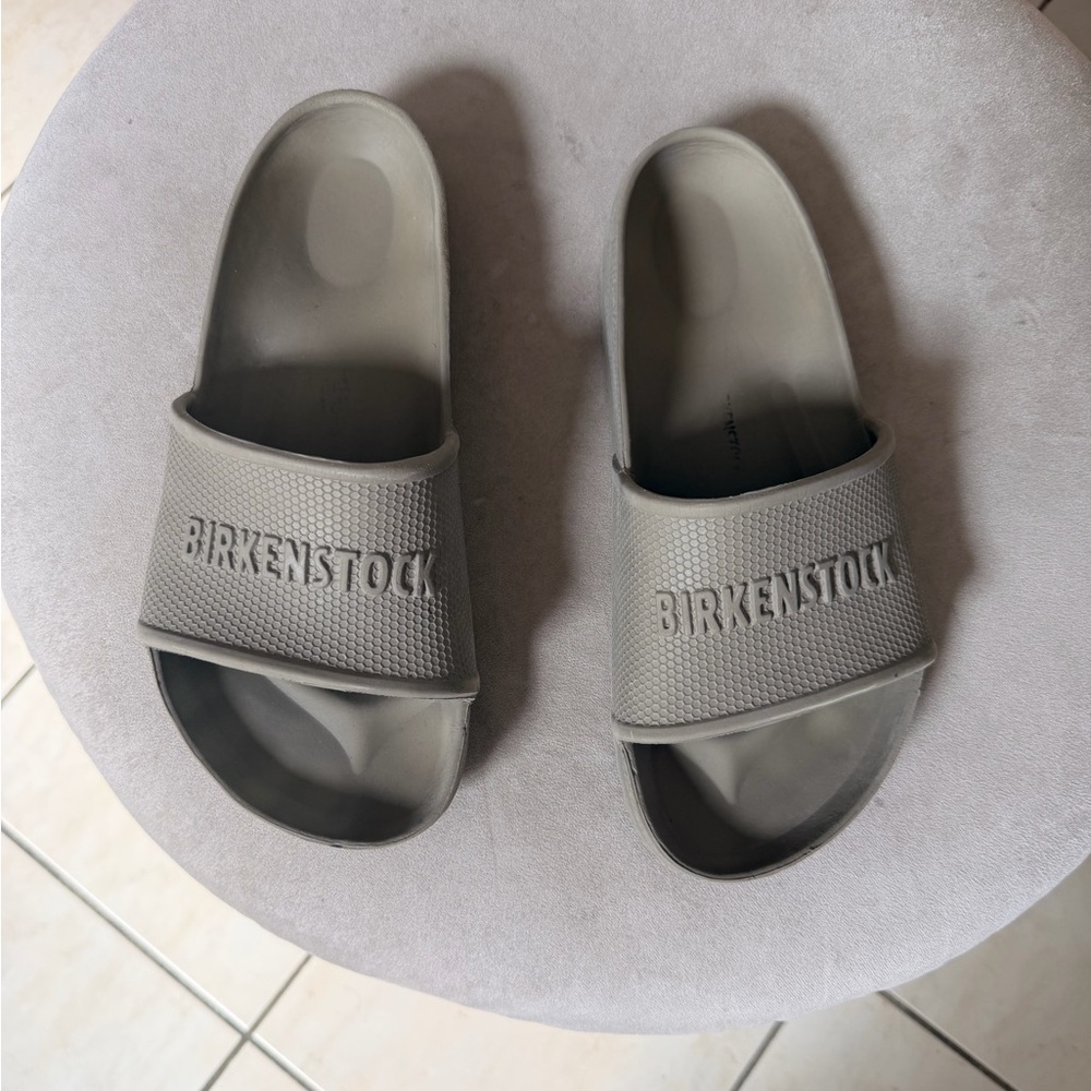Birkenstock Gray Slide Sandals with Embossed Logo